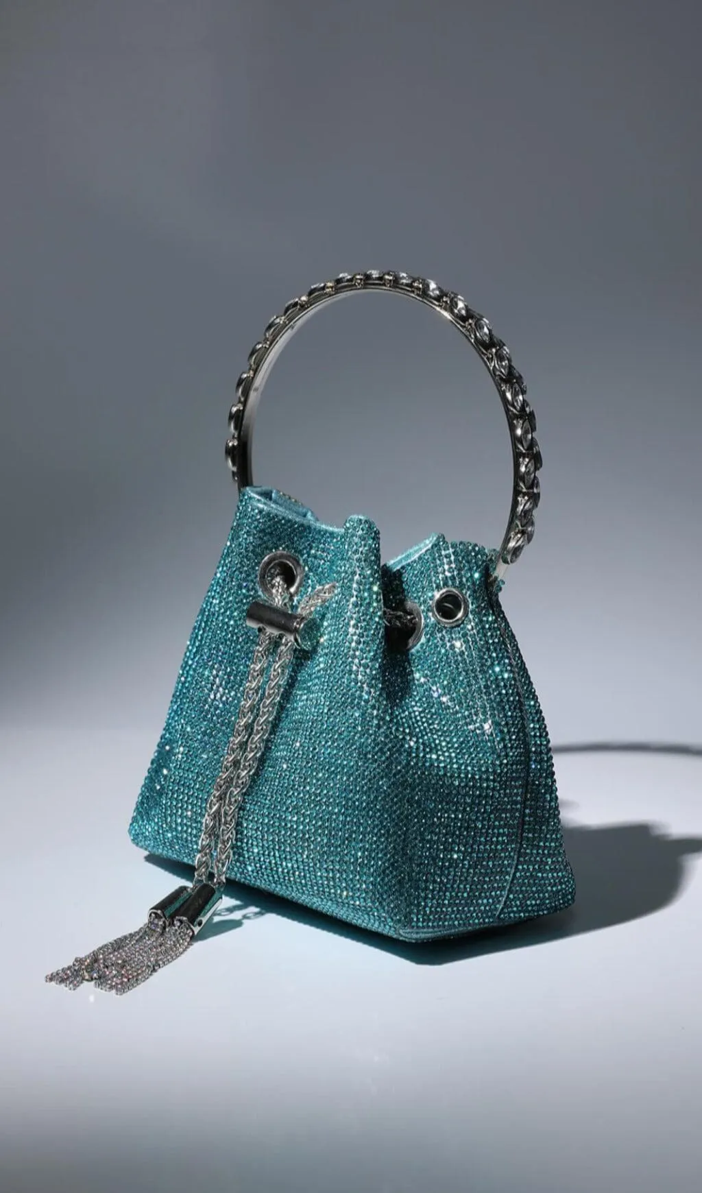 CRYSTAL EMBELLISHED BUCKET BAG IN BLUE Gloria Lanvin