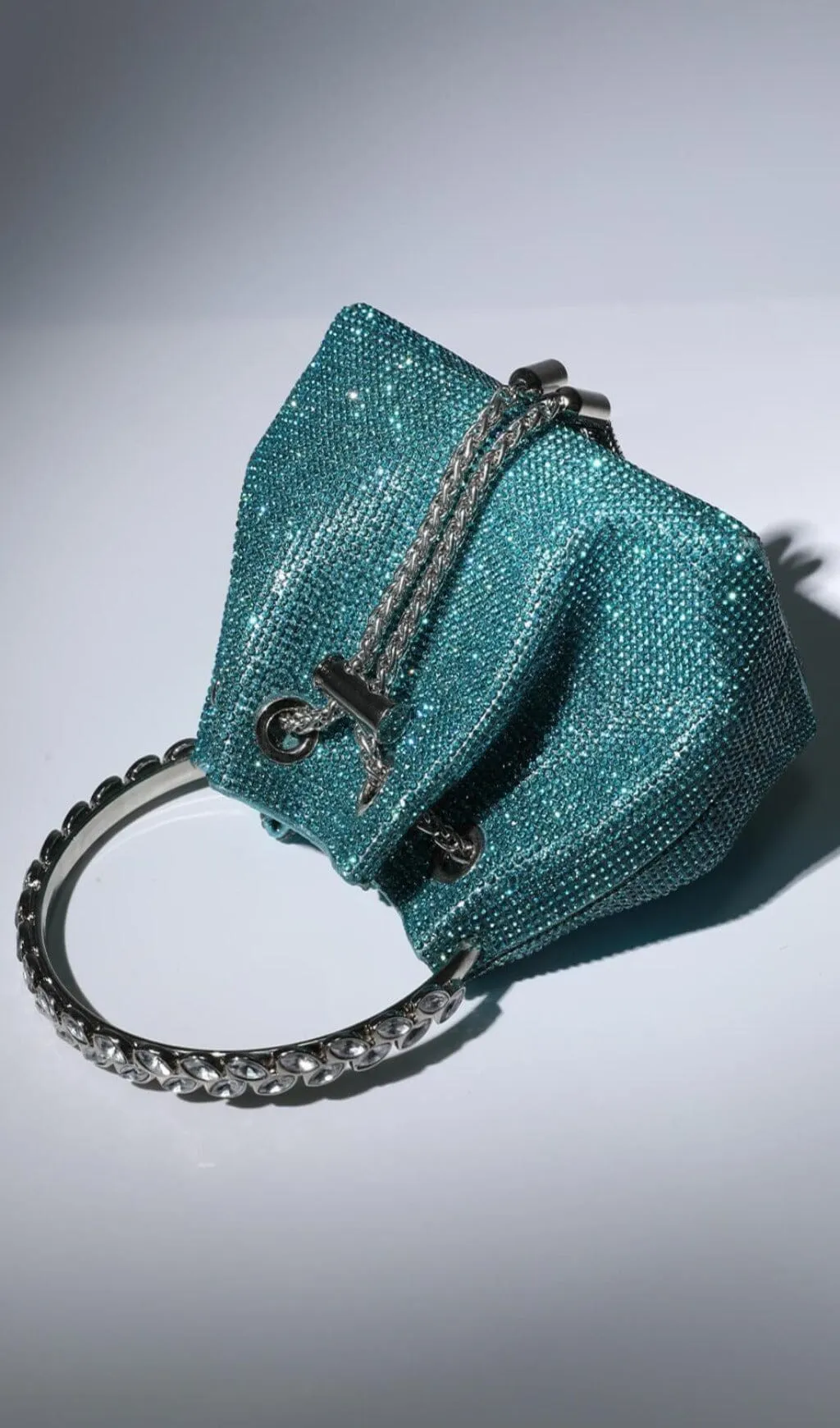 CRYSTAL EMBELLISHED BUCKET BAG IN BLUE Gloria Lanvin