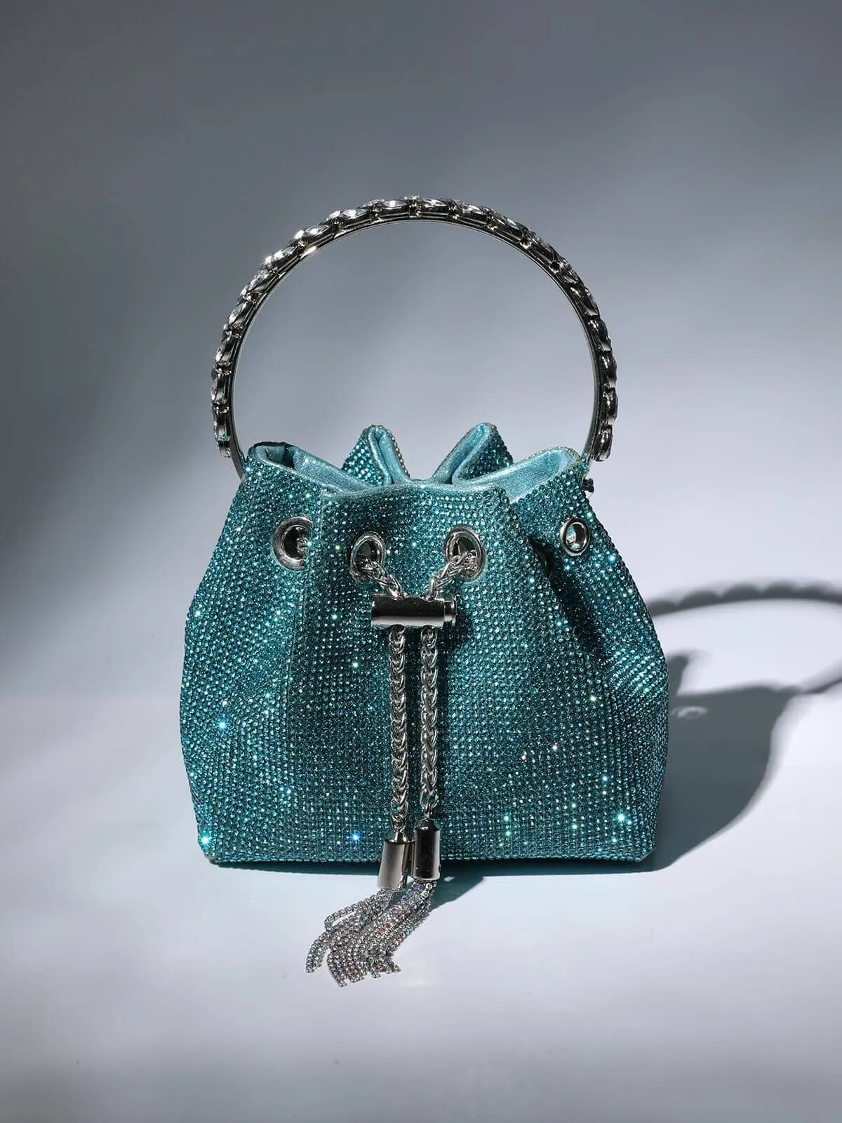 CRYSTAL EMBELLISHED BUCKET BAG IN BLUE Gloria Lanvin
